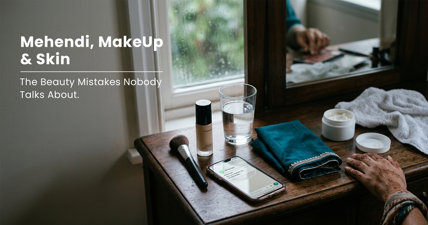 “Mehendi makeup and festive skincare preparation with henna-adorned hands, makeup essentials, moisturiser and water on a dressing table before an Indian celebration.